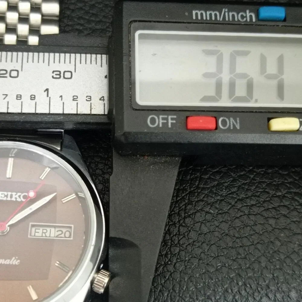 Vintage 1986 Seiko Automatic Mens Silver Watch W/daydate & Brown accents